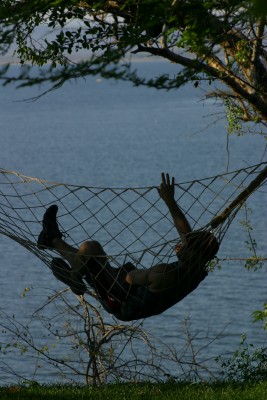 A man in a hammock at The Clubhouse