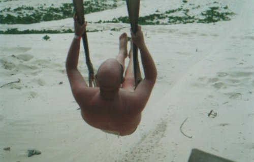 Tony sliding down the sand dunes on a deathslide
