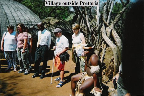 Group of tourists and a local tribal African