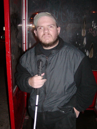 Tony at a bus stop in Reykjavik