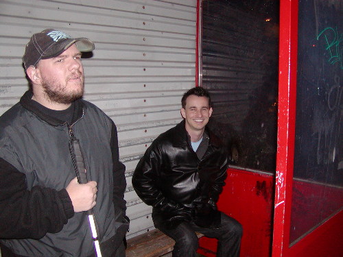 Tony and Mike at a bus stop in Reykjavik