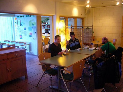 Tony with Ryan and David in the dining room of the hostel in Reykjavik