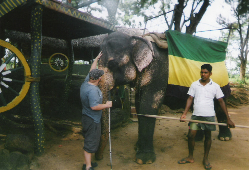 Tony getting acquainted with an elephant, Habarana Elephant Ride, December
