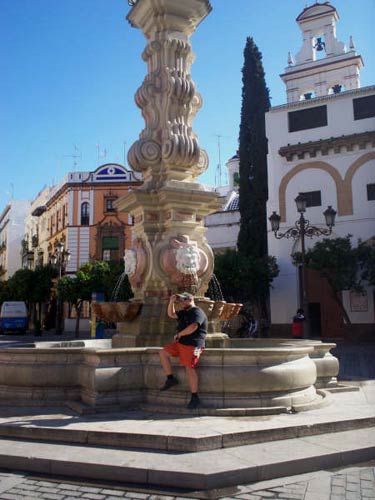Tony sat by a fountain