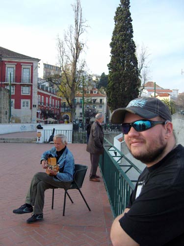 Tony at the lookout with a musician in the background