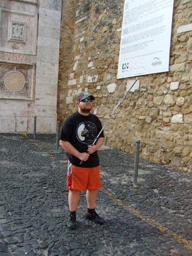 Tony in front of the castle wall