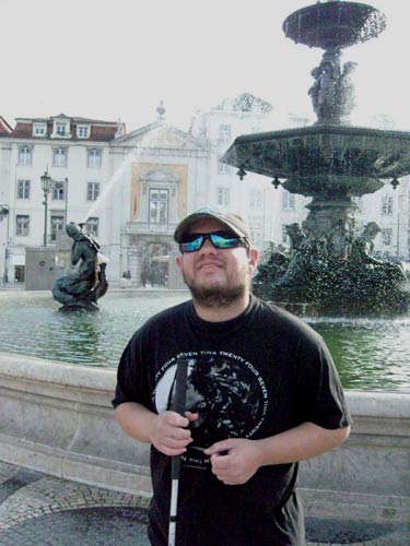 Tony in front of the Rossio Plaza fountain