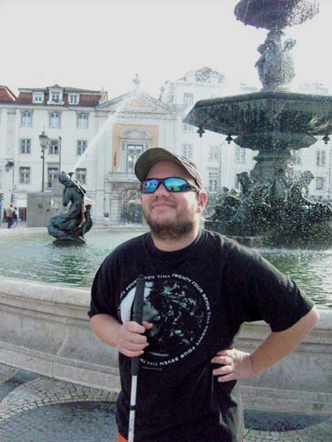 Tony in front of the Rossio Plaza fountain