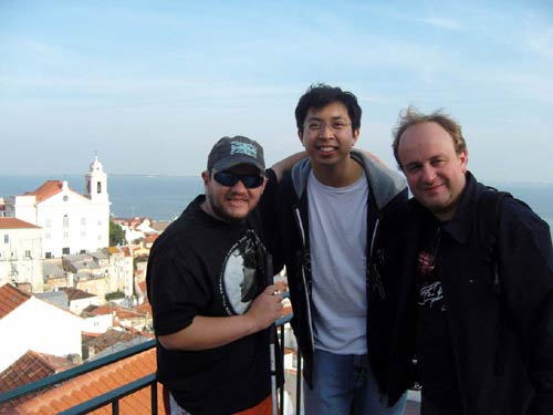 Tony with Leonard and Giovani with a view of the city behind