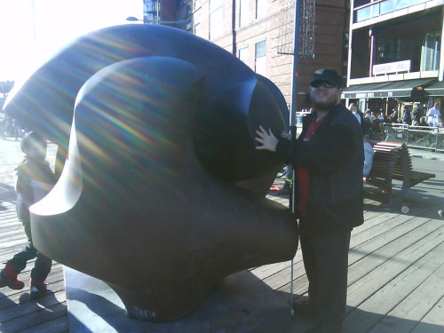 Tony touching sculpture